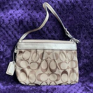 Coach Tan Signature Canvas Wristlet Has Hang Tag Inside Needs Cleaning